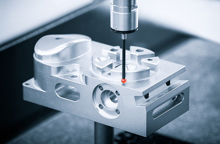 A titanium component being milled during the manufacturing process.